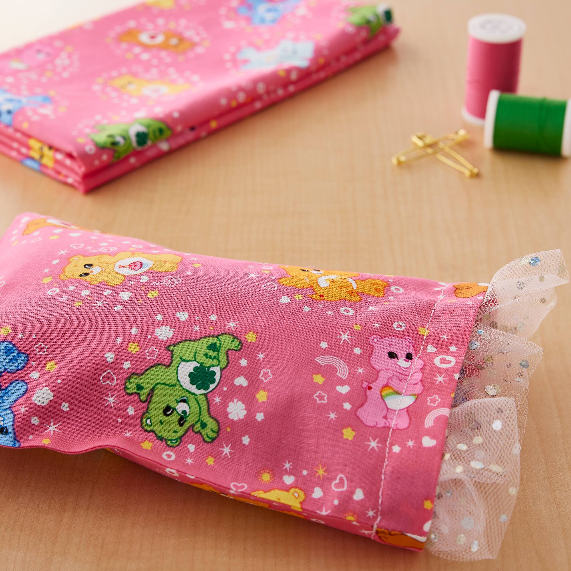 Camelot® Fabrics Care Bears™ Pink Belly Badge Cotton Fabric